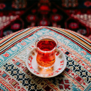 Cup of tea with handicrafts